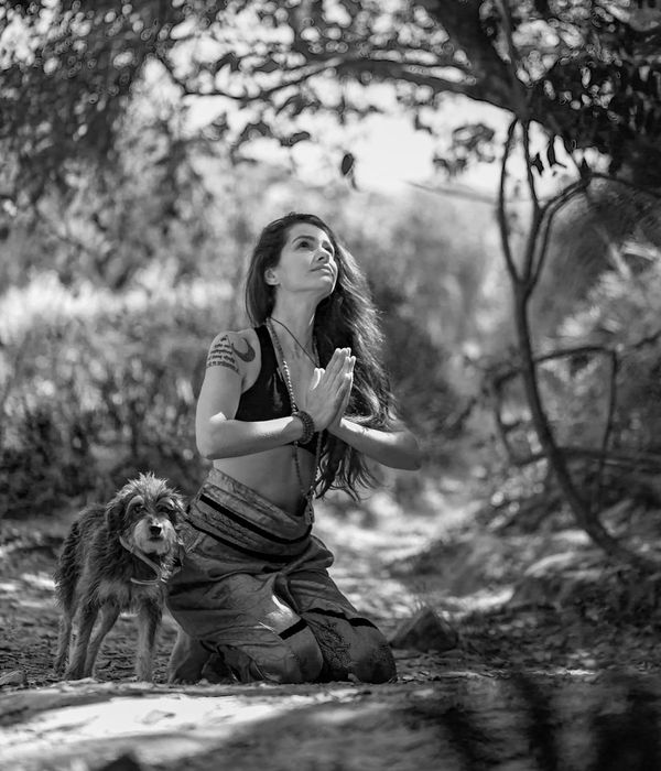 Close-up of a serene face with eyes closed, focusing on breathing.